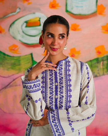 Pakistani placement white suit